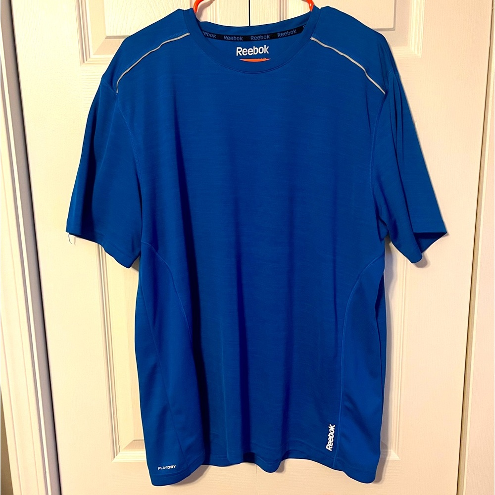 Reebok play fit blue reflective active top